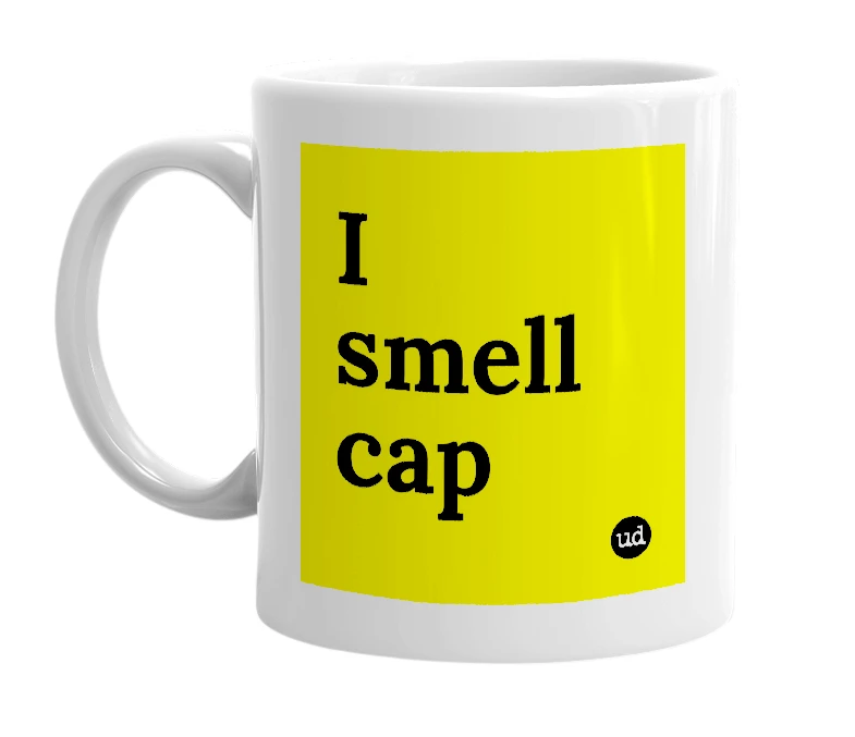 White mug with 'I smell cap' in bold black letters