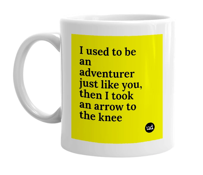 White mug with 'I used to be an adventurer just like you, then I took an arrow to the knee' in bold black letters