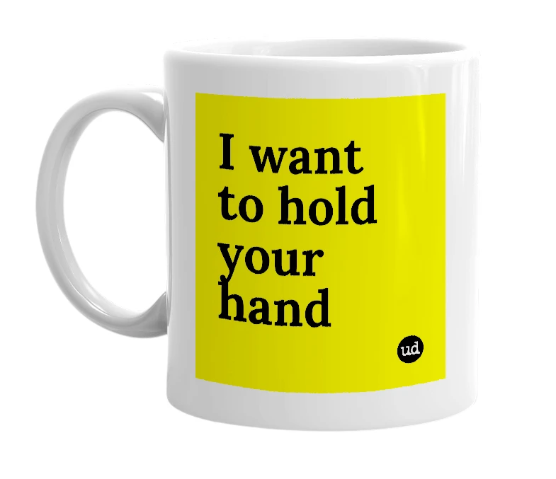 White mug with 'I want to hold your hand' in bold black letters