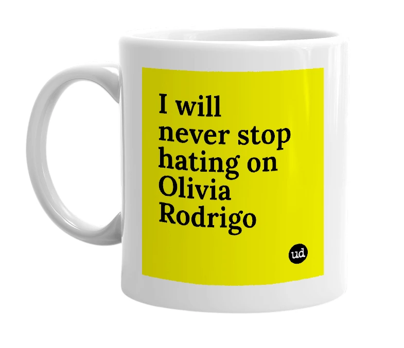 White mug with 'I will never stop hating on Olivia Rodrigo' in bold black letters