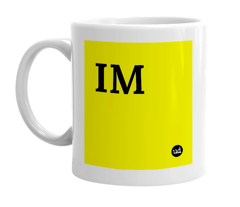 White mug with 'IM' in bold black letters