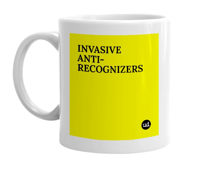 White mug with 'INVASIVE ANTI-RECOGNIZERS' in bold black letters