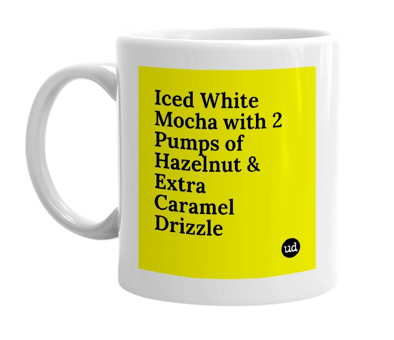 White mug with 'Iced White Mocha with 2 Pumps of Hazelnut & Extra Caramel Drizzle' in bold black letters