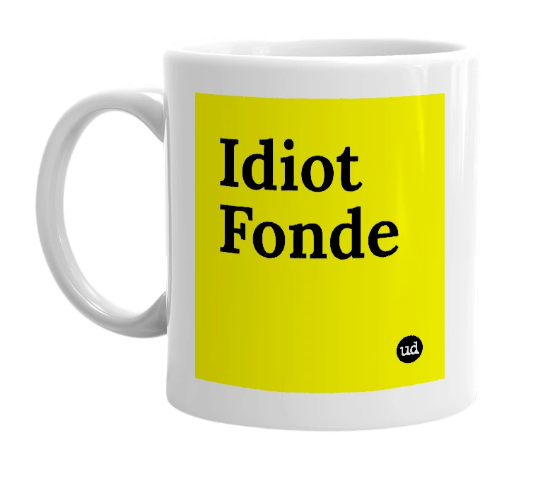 White mug with 'Idiot Fonde' in bold black letters