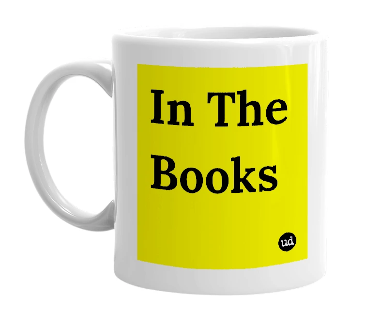 White mug with 'In The Books' in bold black letters