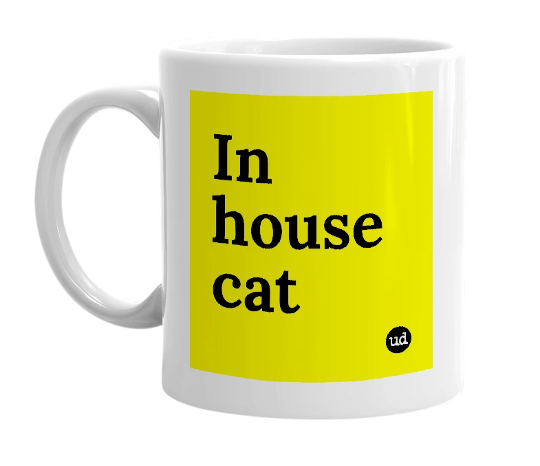 White mug with 'In house cat' in bold black letters