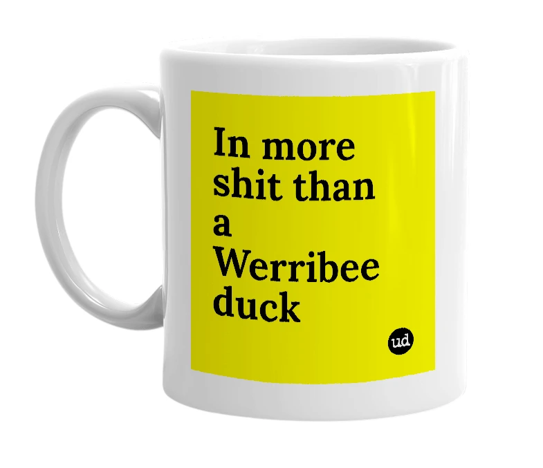 White mug with 'In more shit than a Werribee duck' in bold black letters