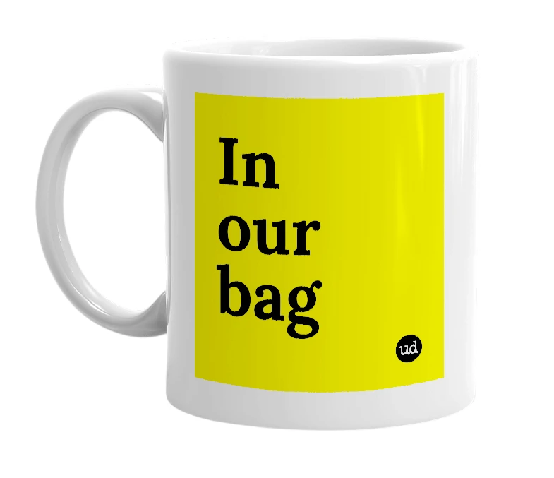 White mug with 'In our bag' in bold black letters