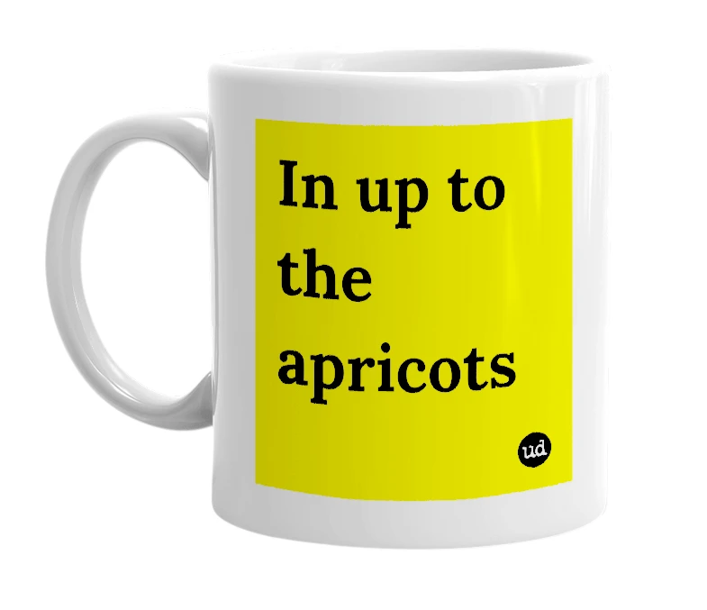 White mug with 'In up to the apricots' in bold black letters