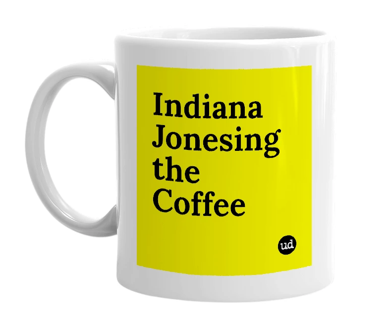 White mug with 'Indiana Jonesing the Coffee' in bold black letters