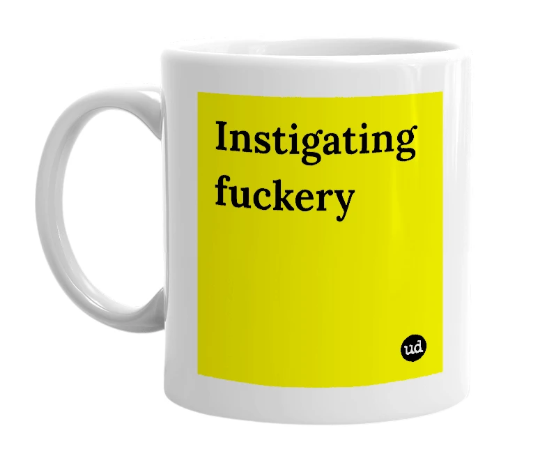 White mug with 'Instigating fuckery' in bold black letters