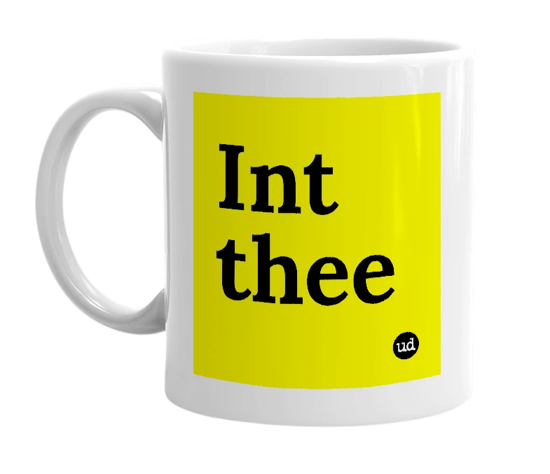 White mug with 'Int thee' in bold black letters