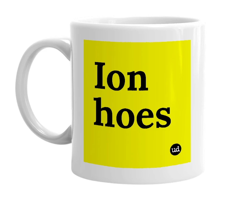 White mug with 'Ion hoes' in bold black letters