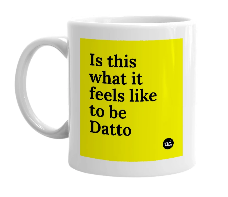 White mug with 'Is this what it feels like to be Datto' in bold black letters