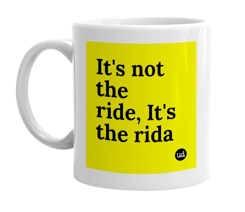 White mug with 'It's not the ride, It's the rida' in bold black letters