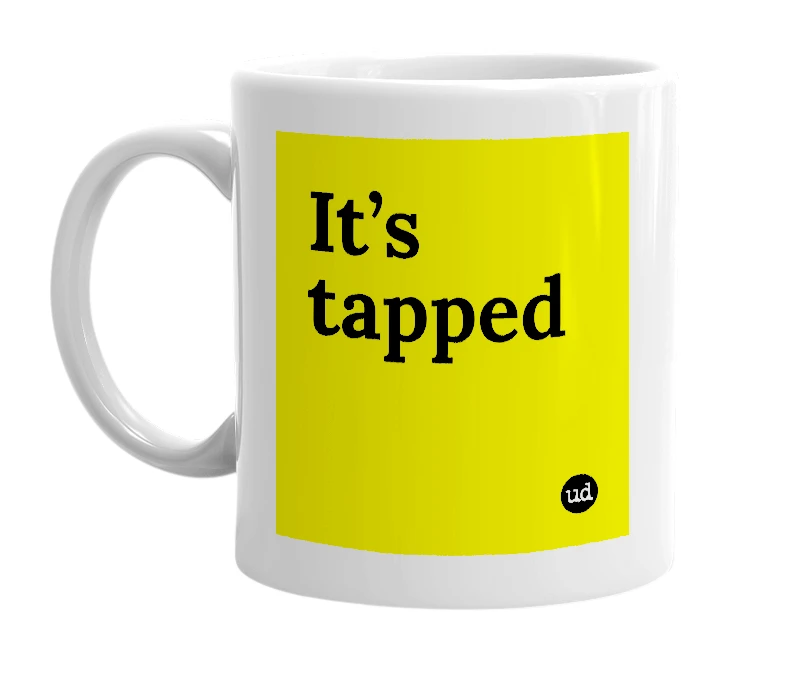 White mug with 'It’s tapped' in bold black letters