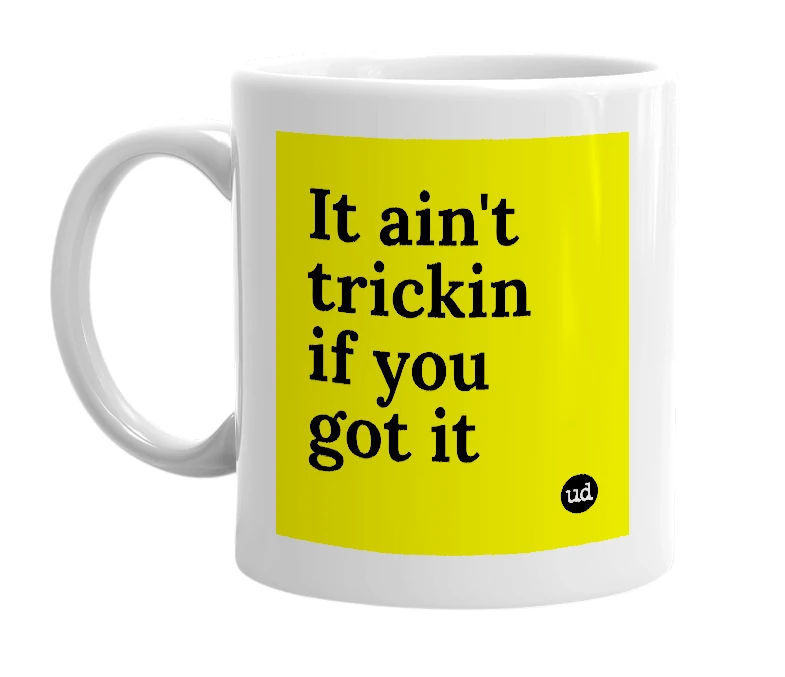 White mug with 'It ain't trickin if you got it' in bold black letters