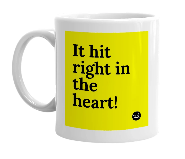 White mug with 'It hit right in the heart!' in bold black letters