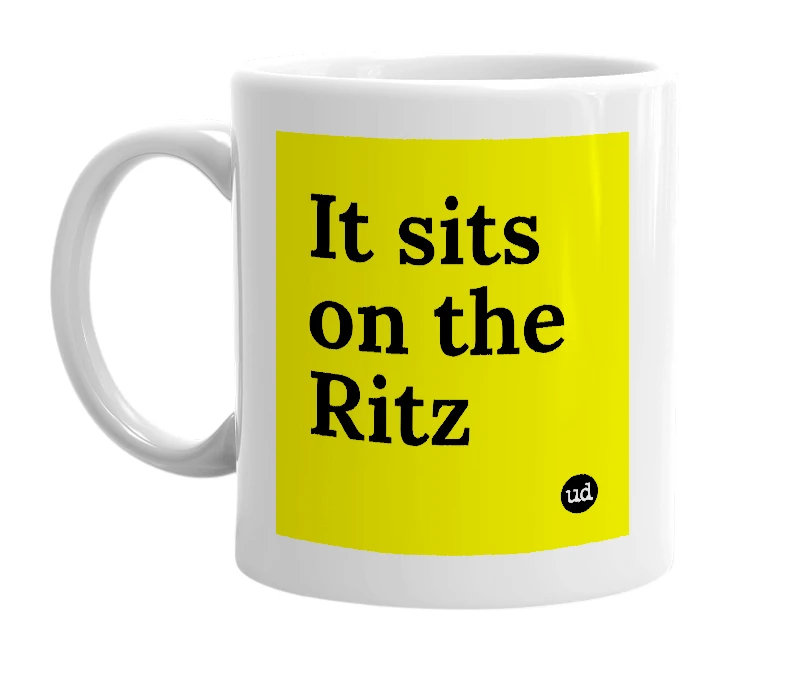 White mug with 'It sits on the Ritz' in bold black letters