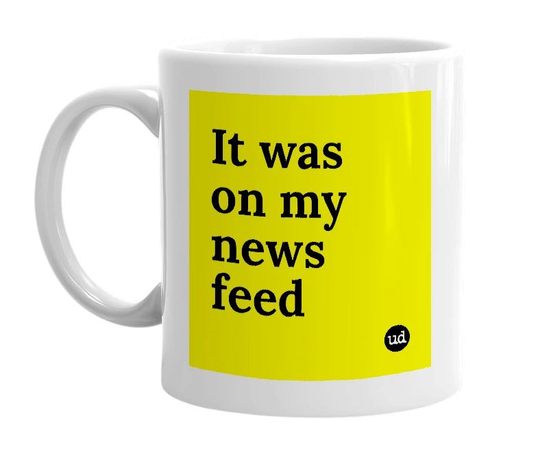 White mug with 'It was on my news feed' in bold black letters