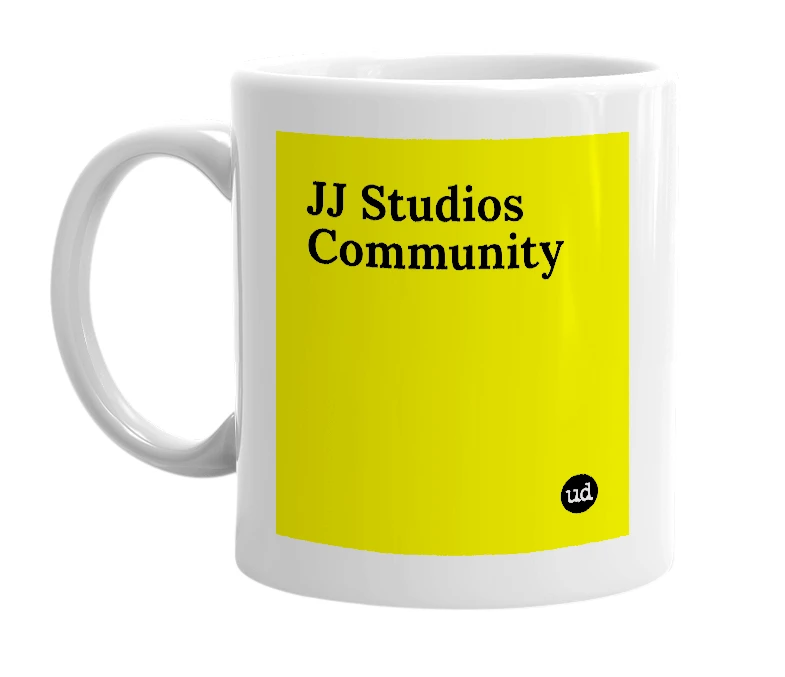 White mug with 'JJ Studios Community' in bold black letters