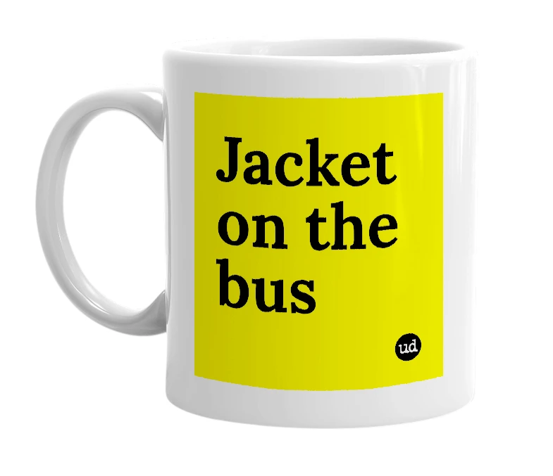 White mug with 'Jacket on the bus' in bold black letters