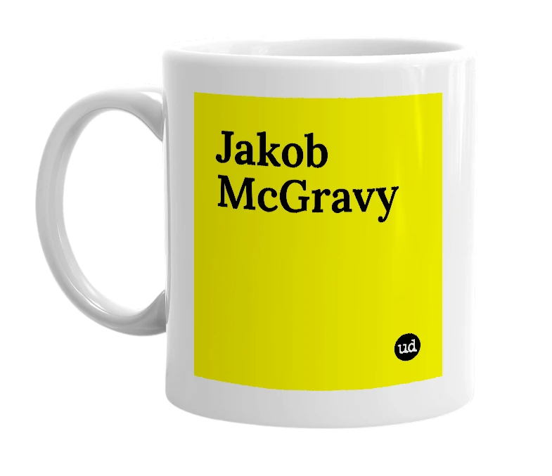 White mug with 'Jakob McGravy' in bold black letters