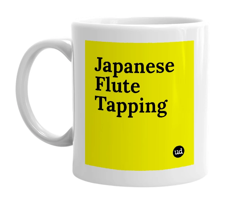 White mug with 'Japanese Flute Tapping' in bold black letters
