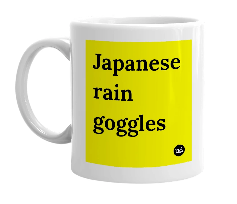 White mug with 'Japanese rain goggles' in bold black letters