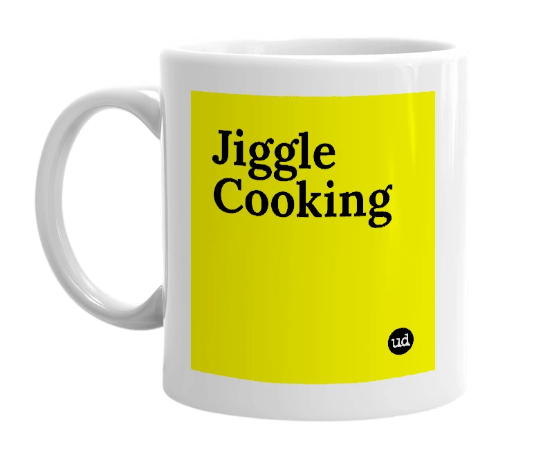 White mug with 'Jiggle Cooking' in bold black letters