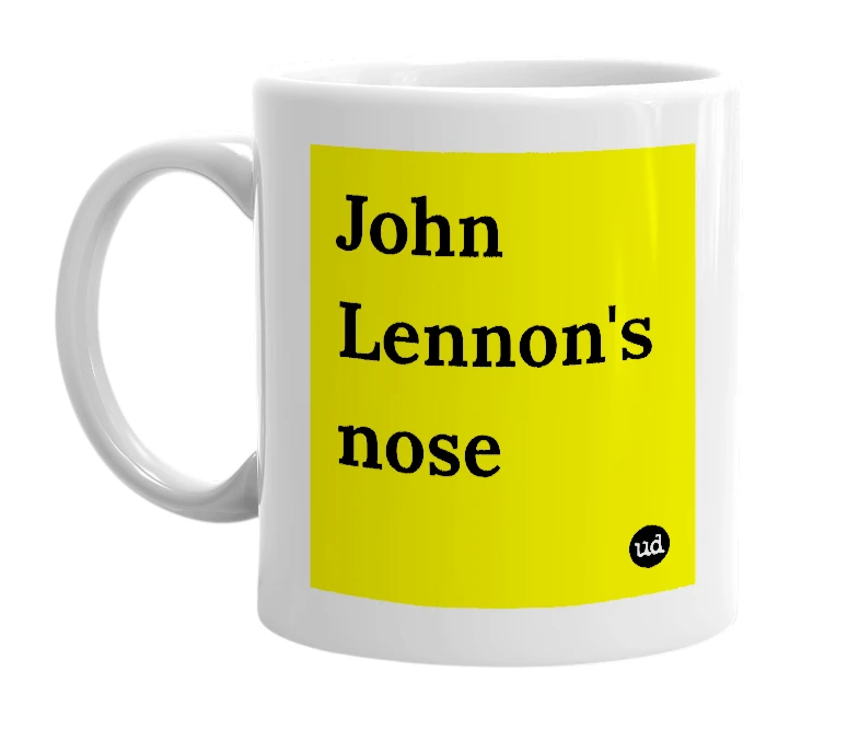 White mug with 'John Lennon's nose' in bold black letters