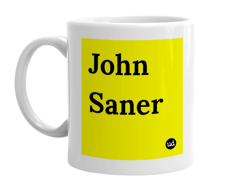 White mug with 'John Saner' in bold black letters