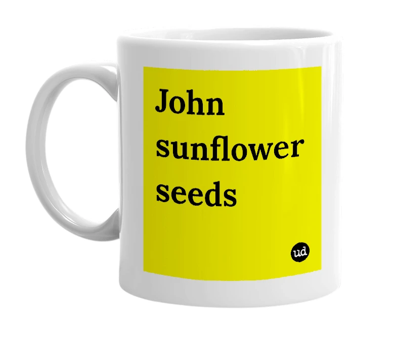 White mug with 'John sunflower seeds' in bold black letters