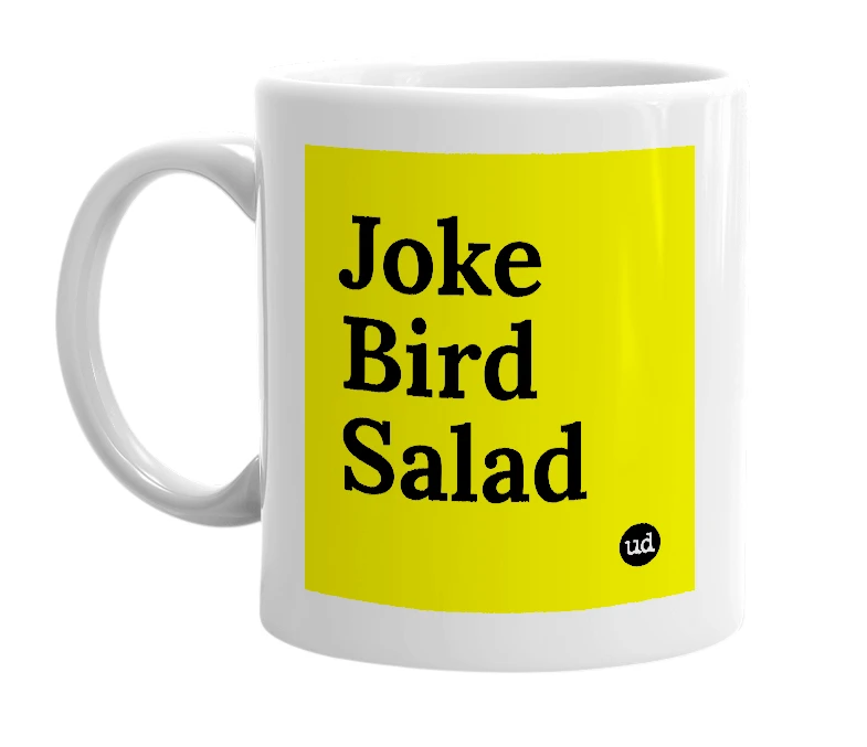 White mug with 'Joke Bird Salad' in bold black letters
