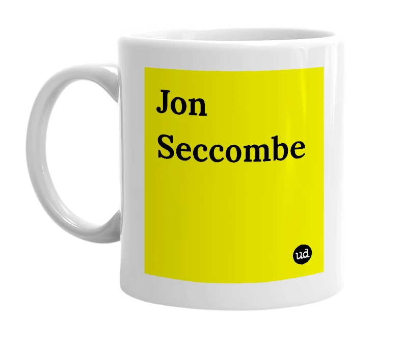 White mug with 'Jon Seccombe' in bold black letters