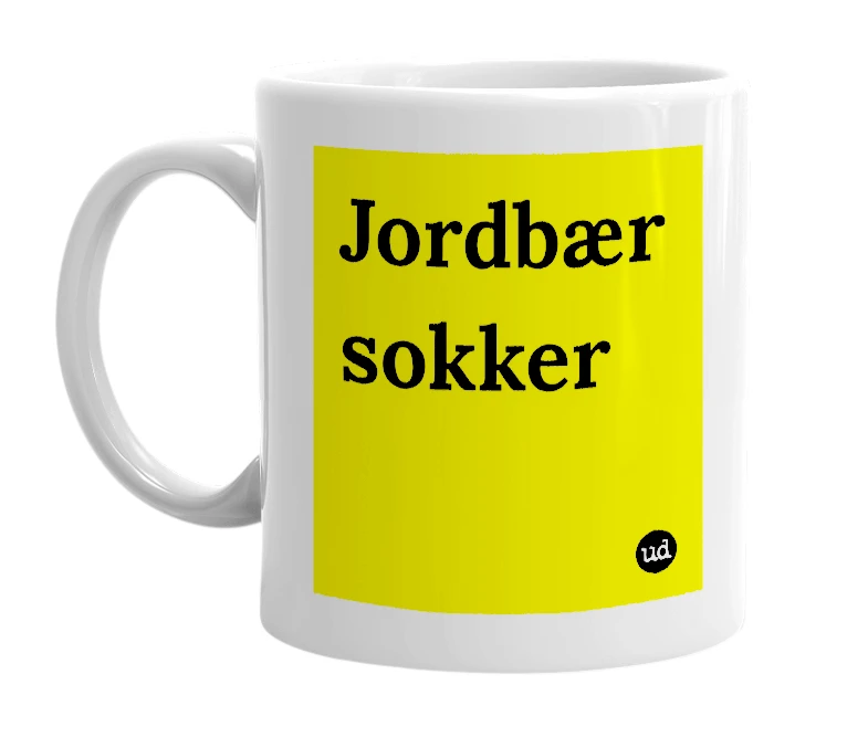 White mug with 'Jordbær sokker' in bold black letters