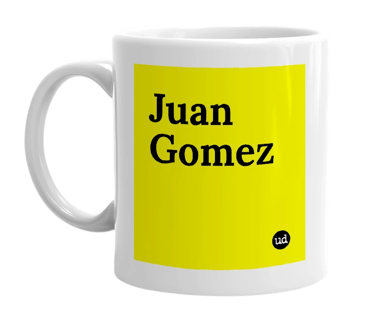 White mug with 'Juan Gomez' in bold black letters