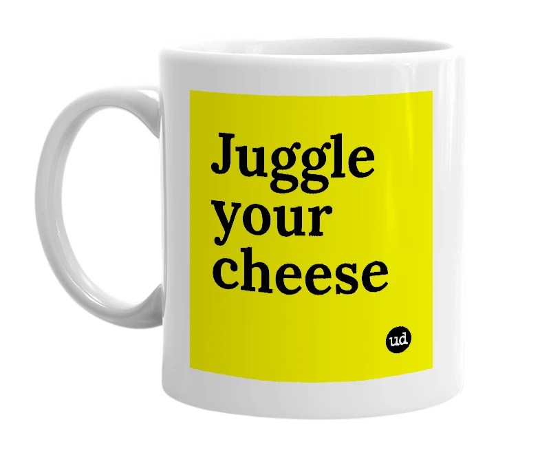 White mug with 'Juggle your cheese' in bold black letters