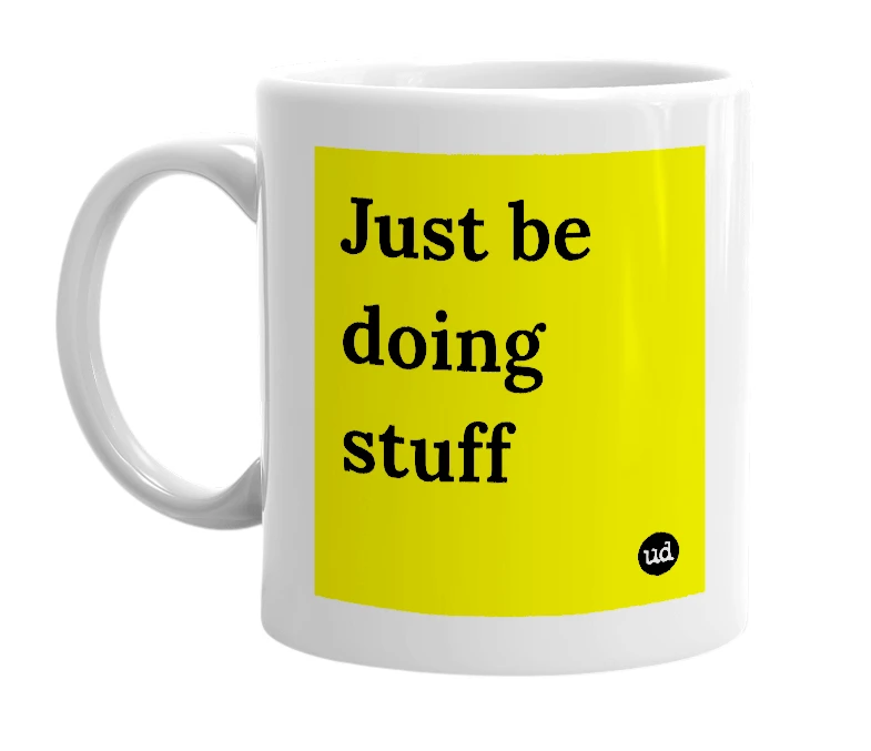 White mug with 'Just be doing stuff' in bold black letters