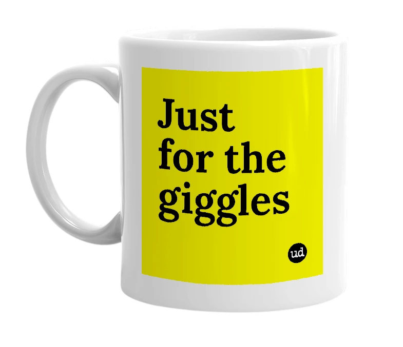 White mug with 'Just for the giggles' in bold black letters