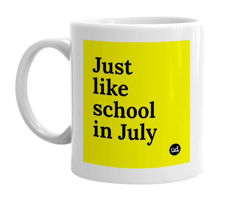 White mug with 'Just like school in July' in bold black letters