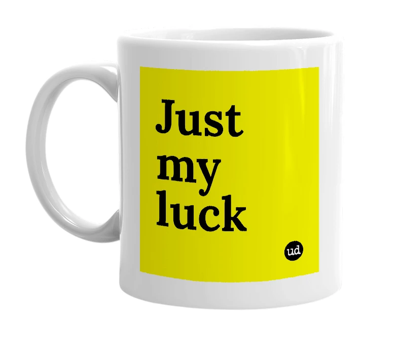 White mug with 'Just my luck' in bold black letters