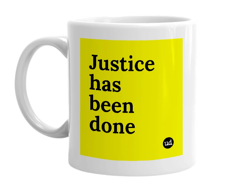 White mug with 'Justice has been done' in bold black letters