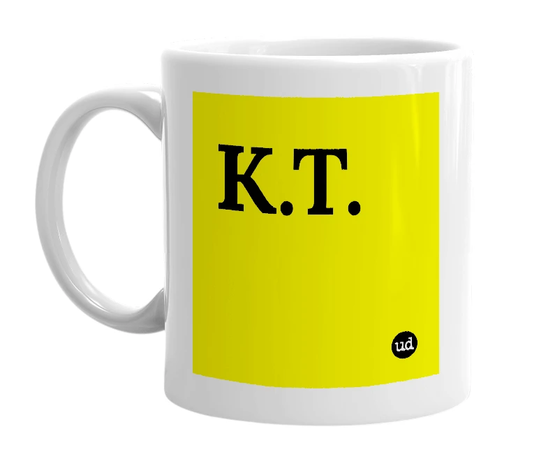 White mug with 'K.T.' in bold black letters