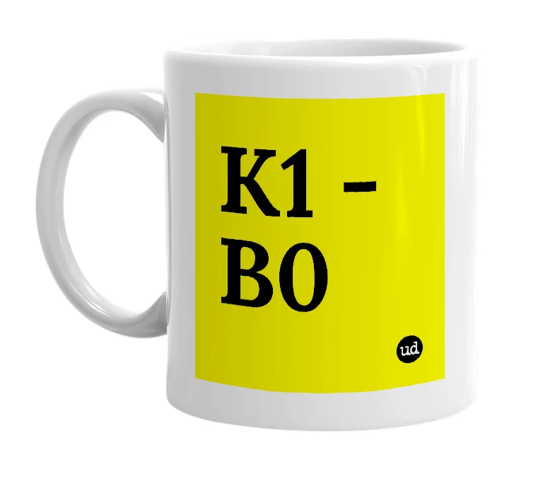 White mug with 'K1 - B0' in bold black letters