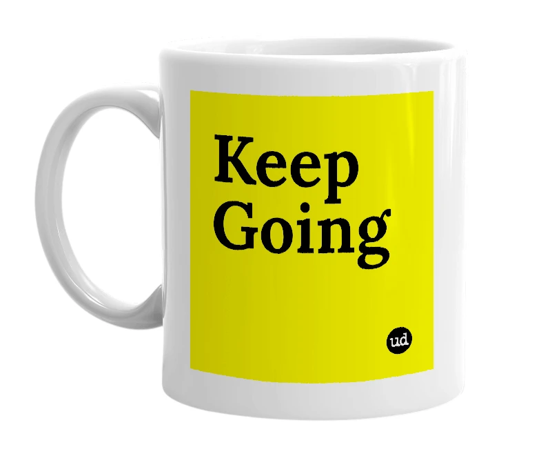 White mug with 'Keep Going' in bold black letters