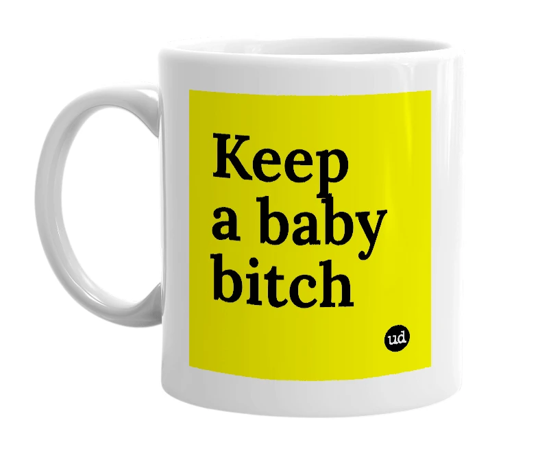 White mug with 'Keep a baby bitch' in bold black letters