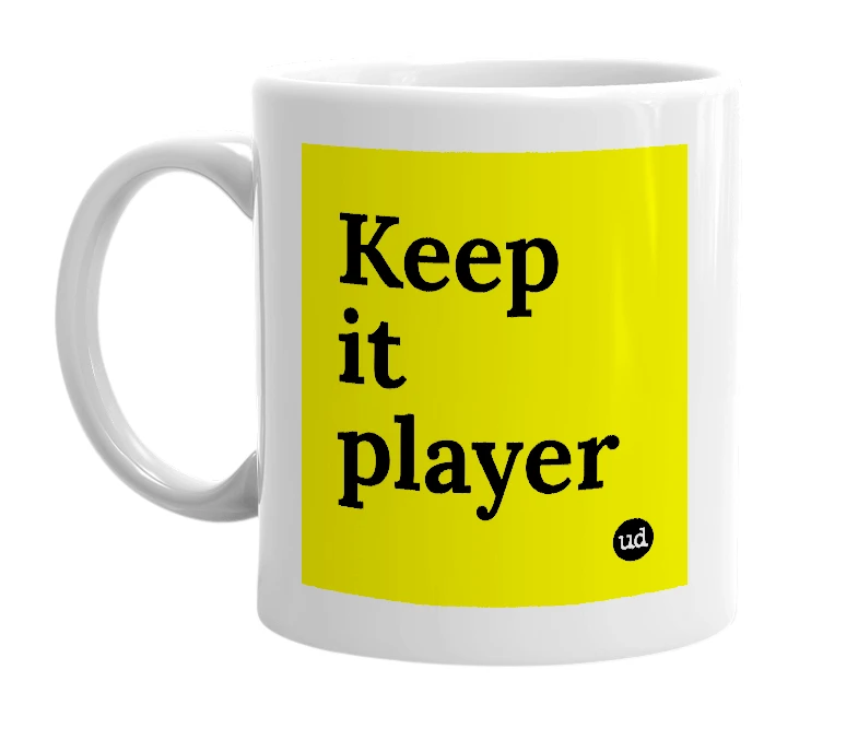 White mug with 'Keep it player' in bold black letters