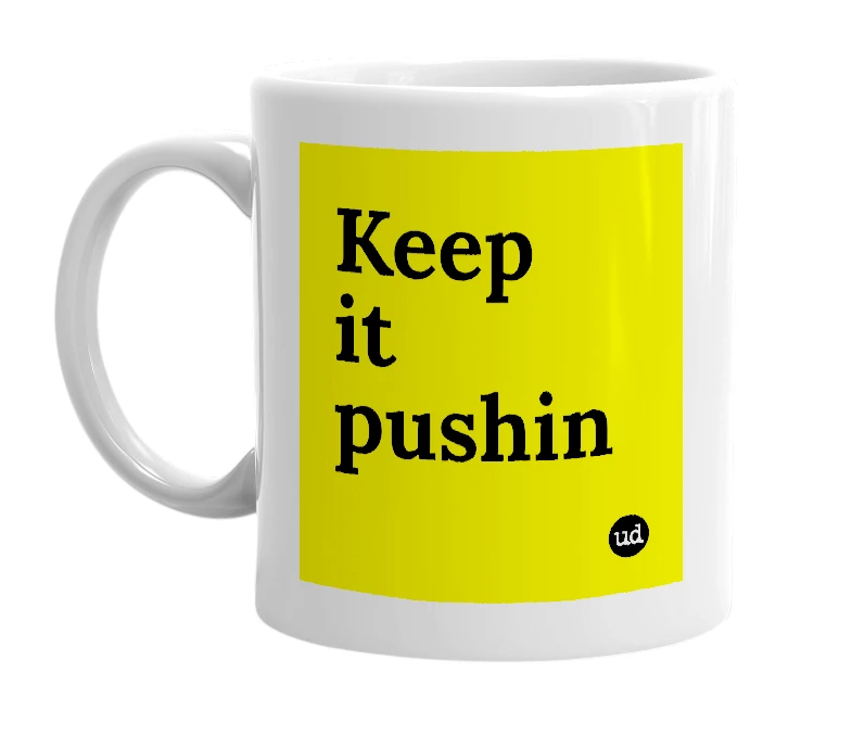 White mug with 'Keep it pushin' in bold black letters