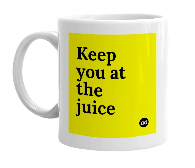 White mug with 'Keep you at the juice' in bold black letters